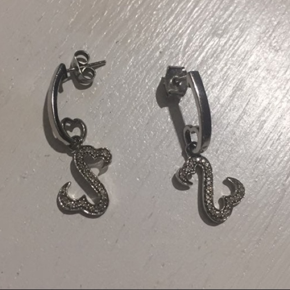 Jane Seymour open heart earrings.
